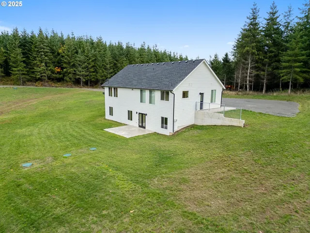 a house view with a garden space