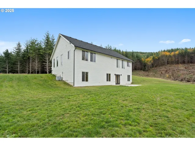 a house view with a backyard space