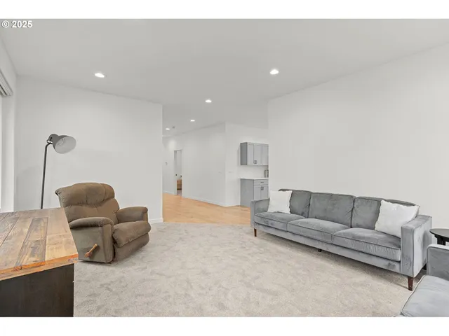 a living room with furniture and a couch