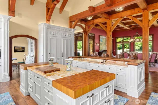 a view of a kitchen with a sink and living room