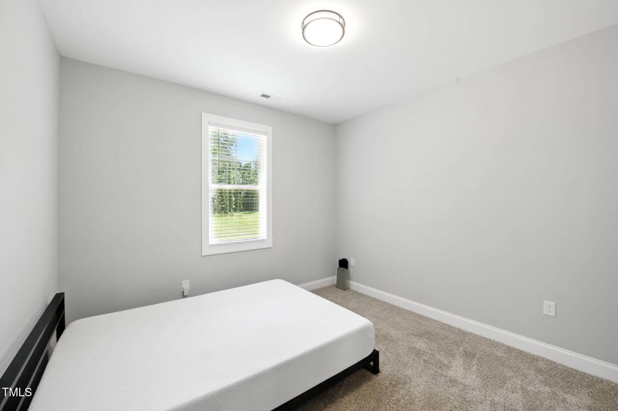 3901 Alpha Court Bailey, NC 27807 - Photo 25 of 36 20_3901_Alpha_Ct_Bailey_NC_27807_USA-Bed