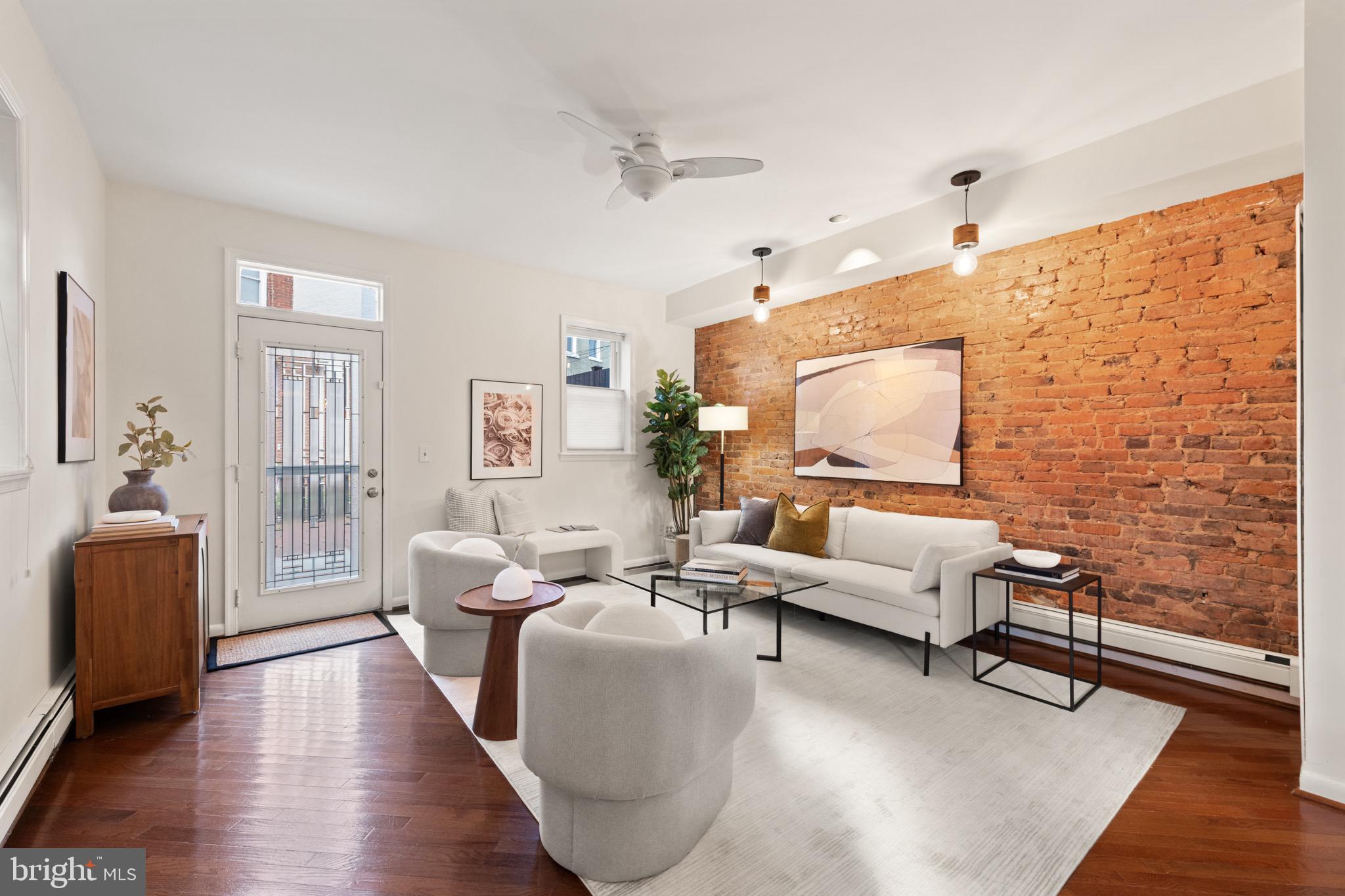 1641 V Street Northwest Washington, DC 20009 - Photo 16 of 36 a living room with furniture and wooden floor