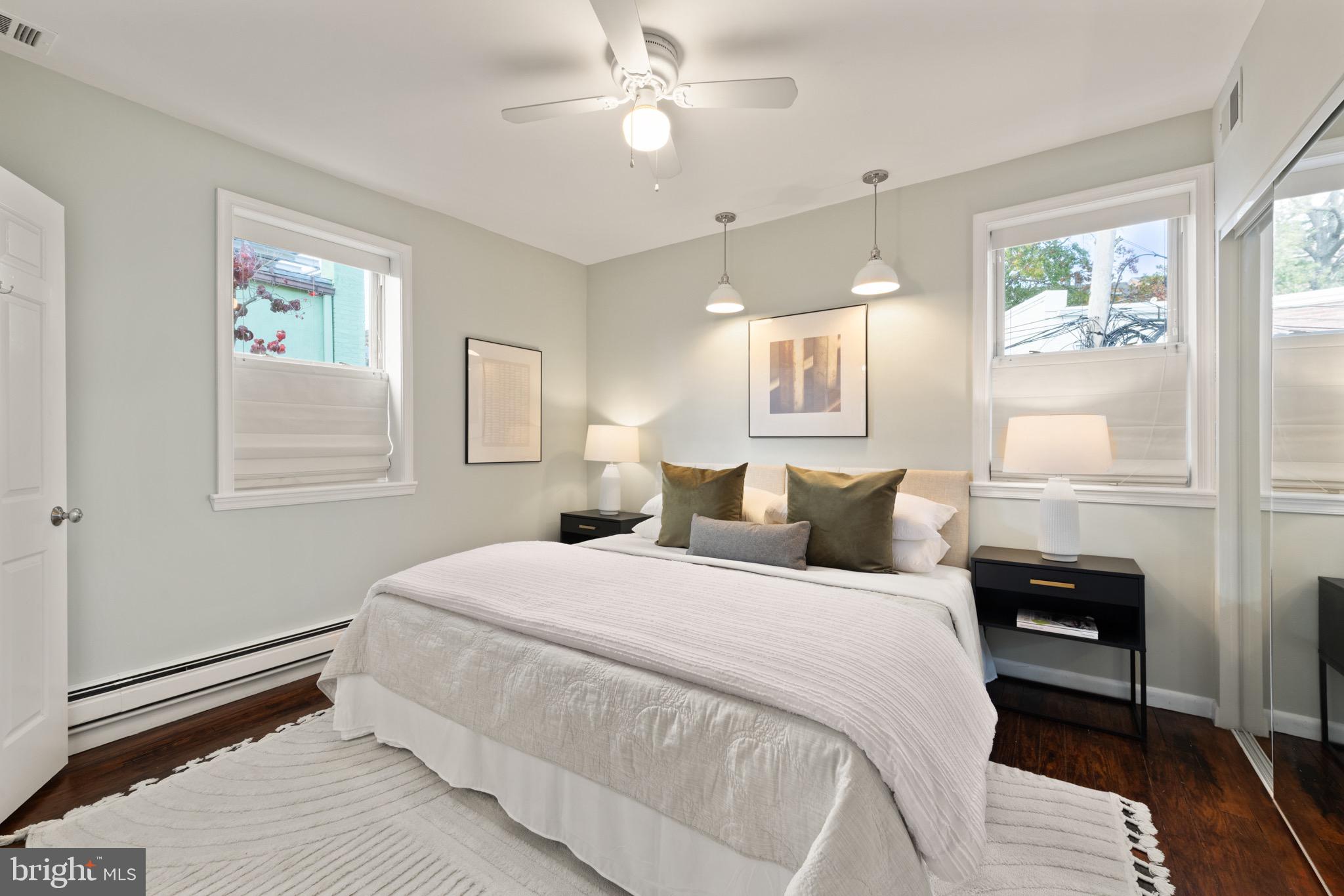 1641 V Street Northwest Washington, DC 20009 - Photo 19 of 36 a bedroom with a bed and a window