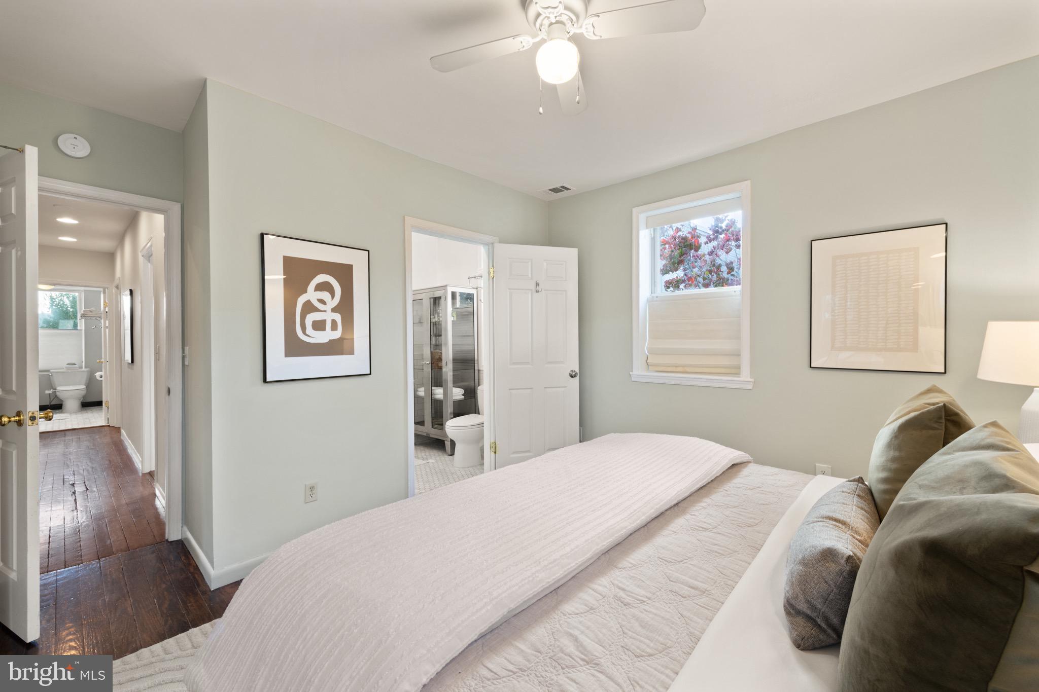 1641 V Street Northwest Washington, DC 20009 - Photo 20 of 36 a bedroom with a large bed and a window