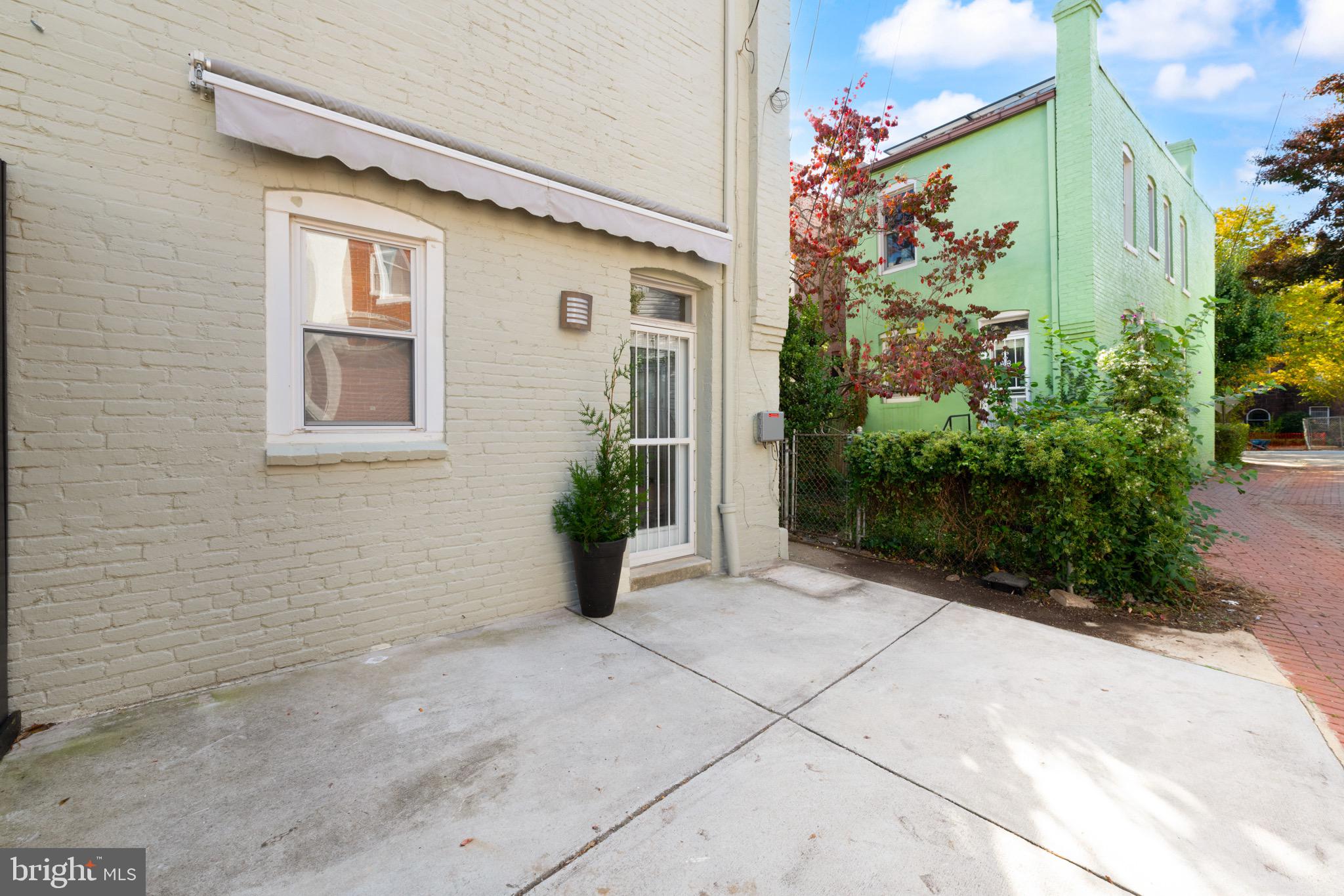 1641 V Street Northwest Washington, DC 20009 - Photo 29 of 36 a view of a house with potted plants