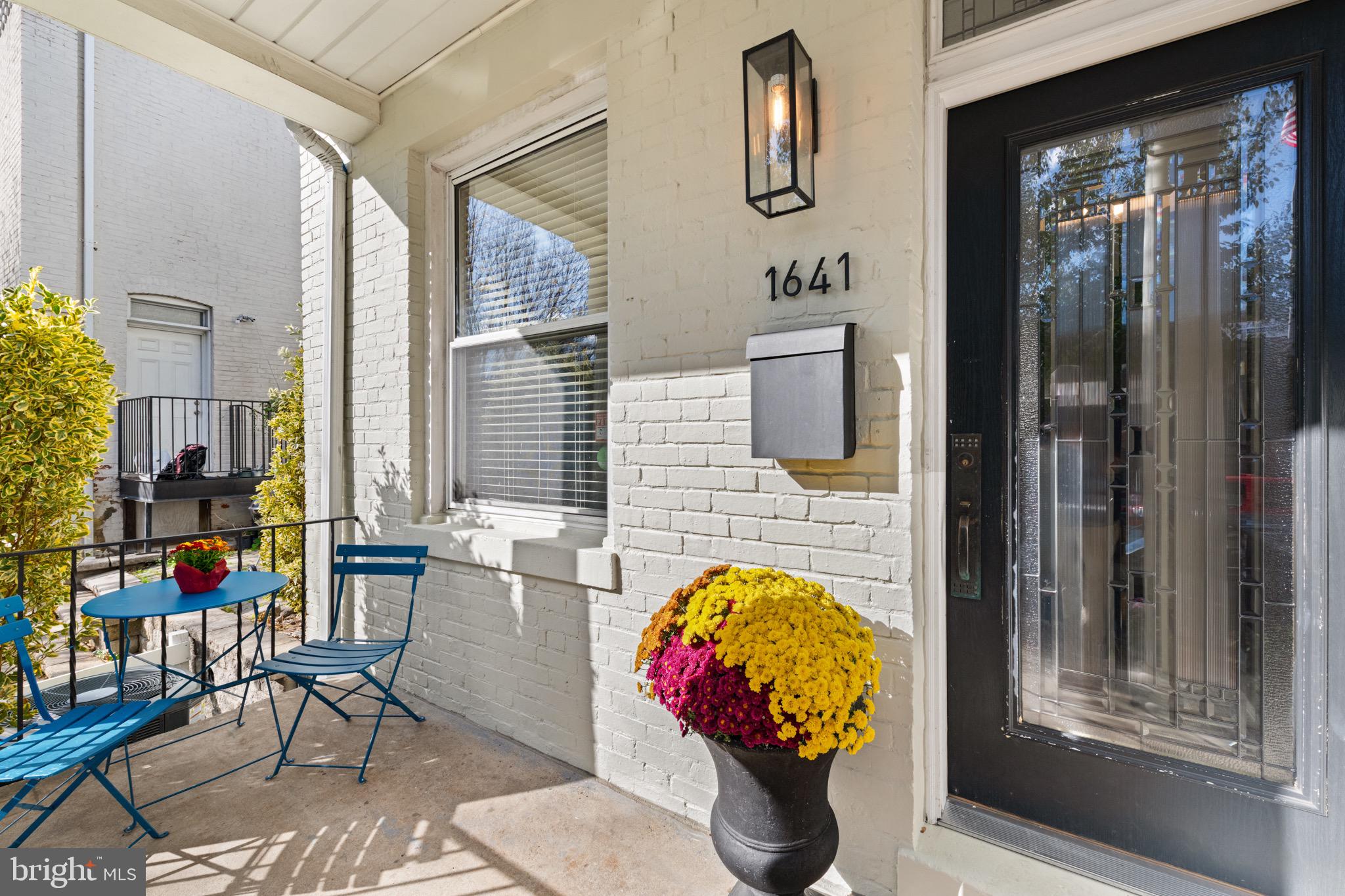 1641 V Street Northwest Washington, DC 20009 - Photo 4 of 36 a swimming pool with outdoor seating