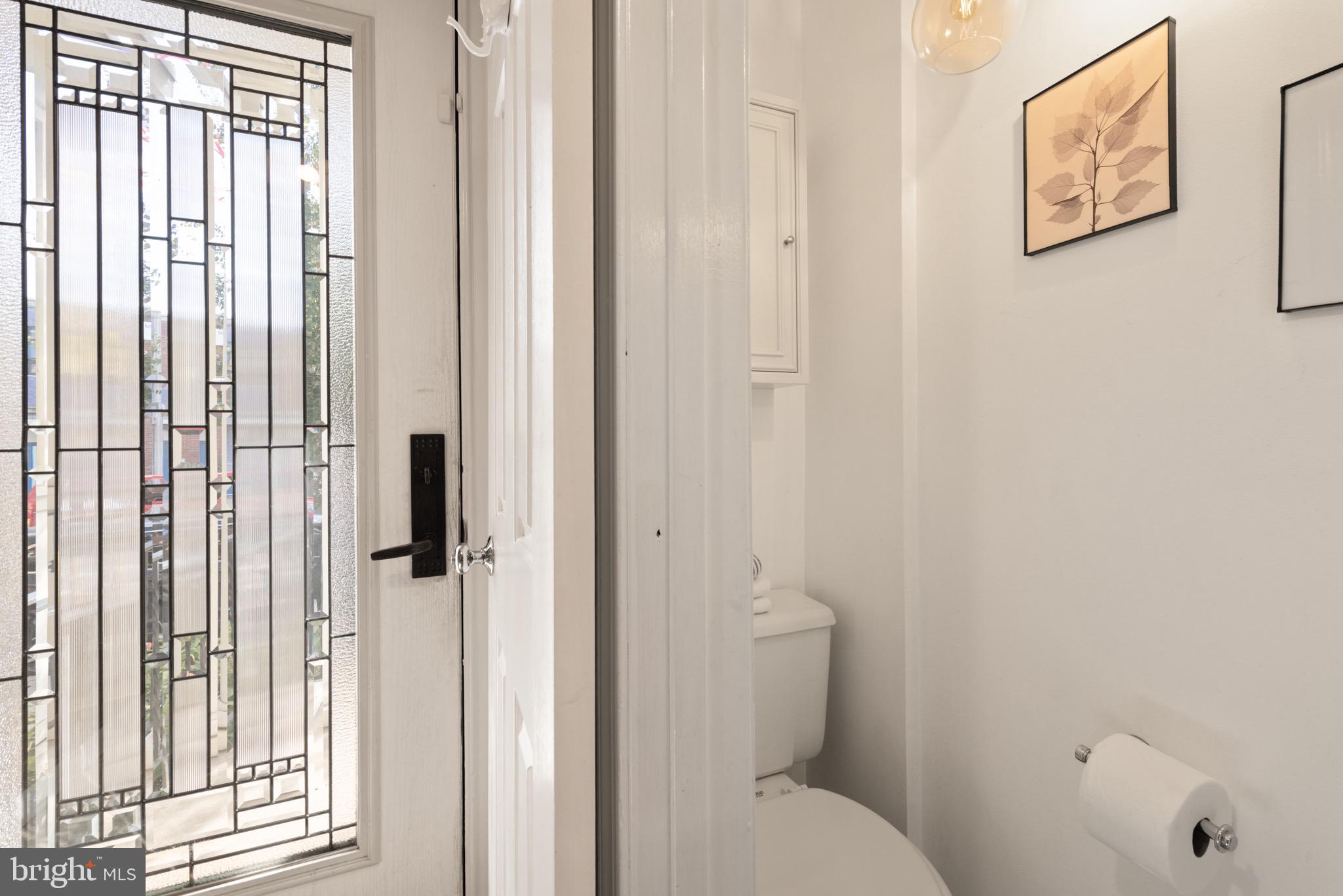 1641 V Street Northwest Washington, DC 20009 - Photo 7 of 36 a bathroom with a toilet and a shower