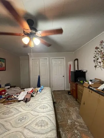 a bathroom with a toilet and shower