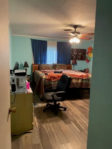 a bathroom with a shower and a sink