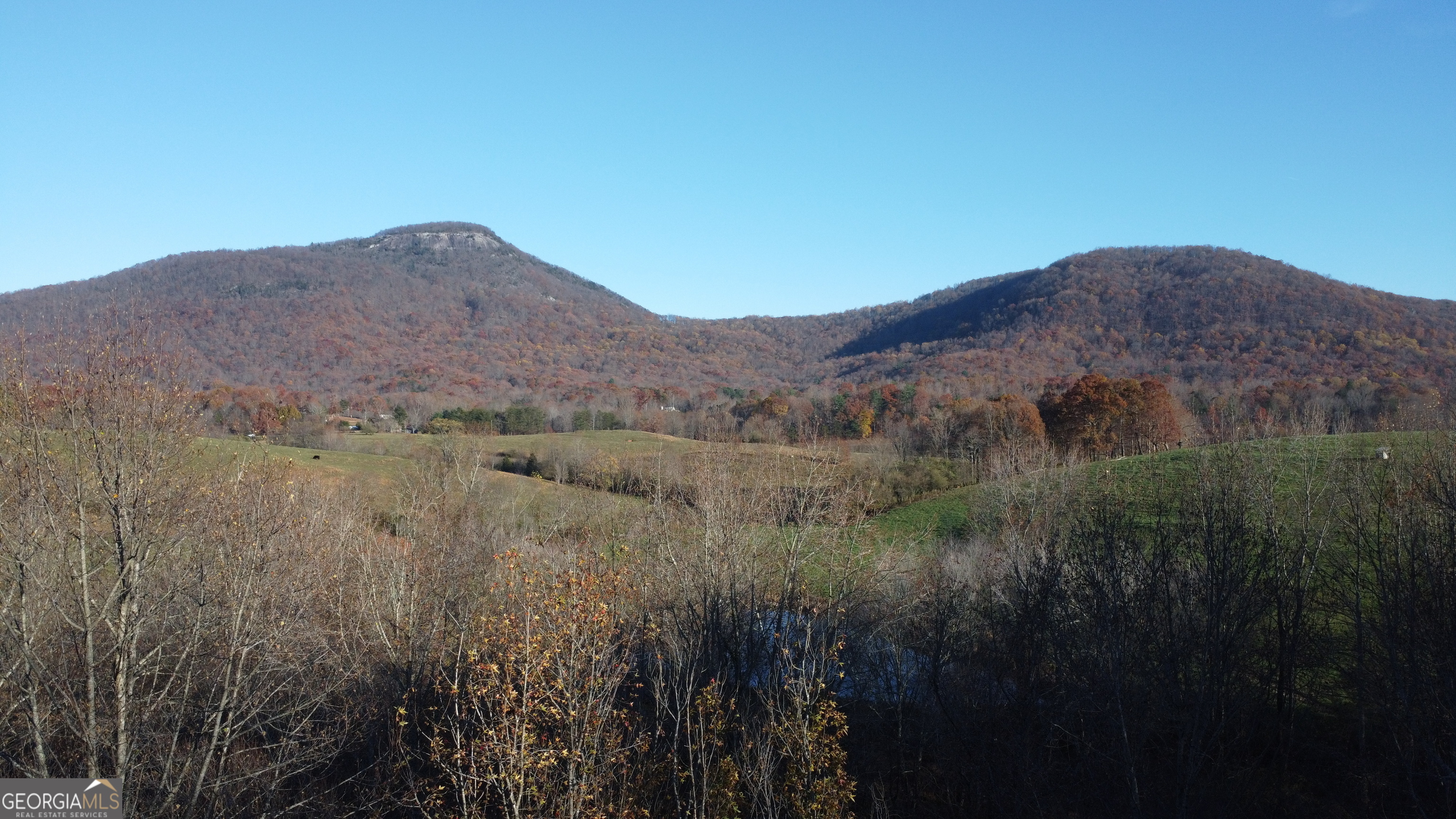 0 Helen Highway Cleveland, GA 30528 - Photo 2 of 12 a view of a house with a mountain in the background
