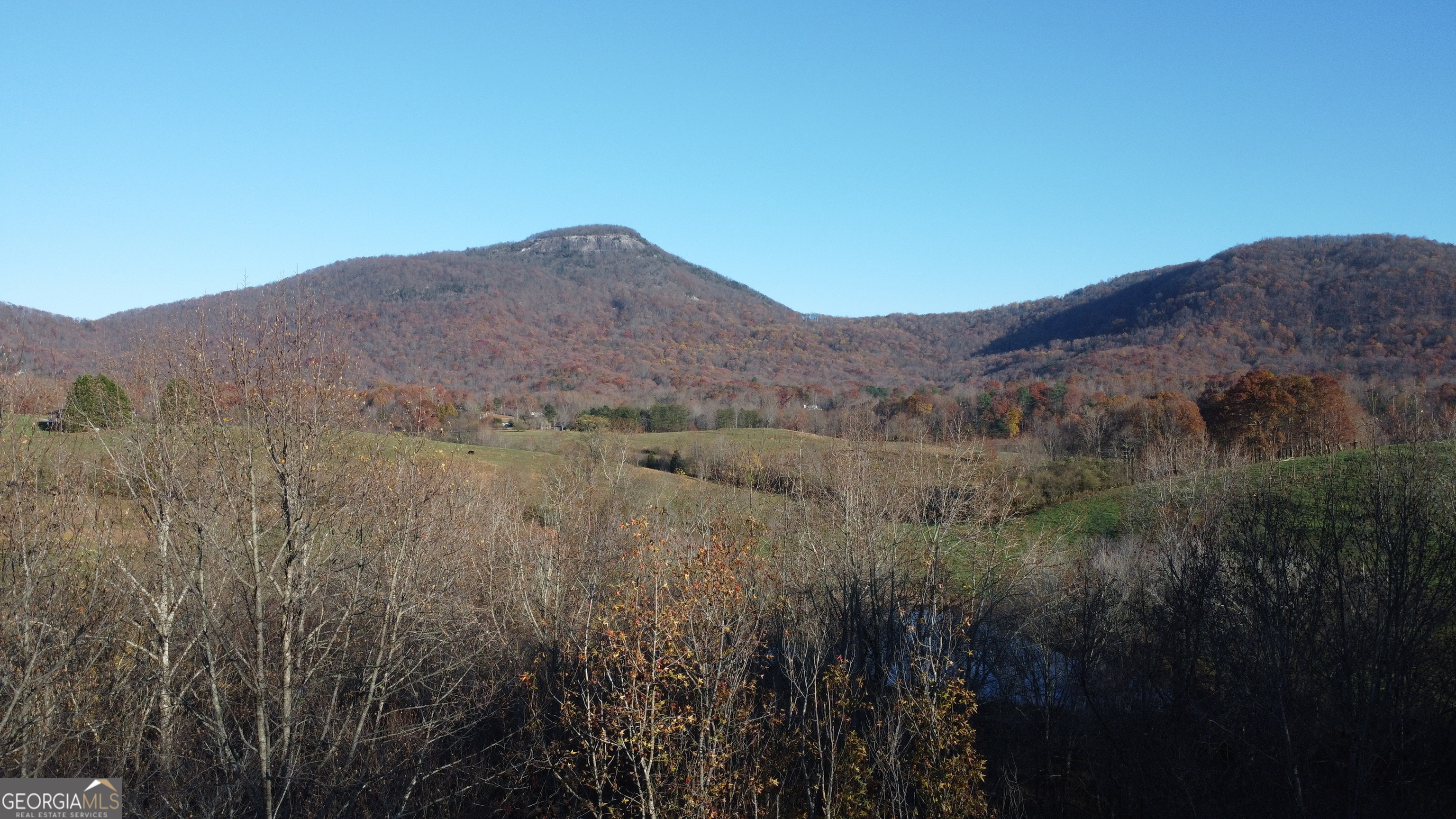 0 Helen Highway Cleveland, GA 30528 - Photo 9 of 12 a view of a house with a mountain in the background