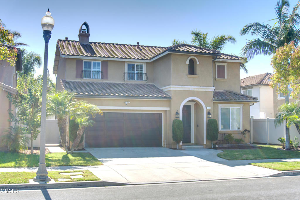 615 Halifax Lane Oxnard, CA 93035 - Photo 1 of 35 a front view of a house with garden