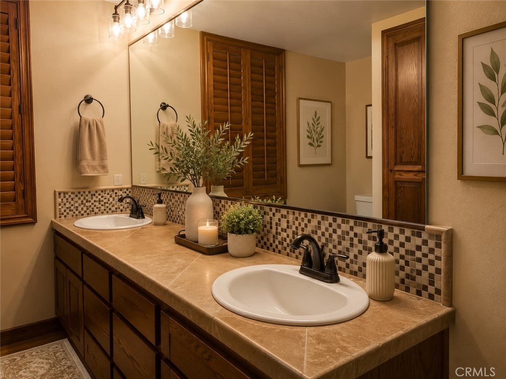 9126 Kittering Road Oak Hills, CA 92344 - Photo 33 of 47 AI Digitally Enhanced Bathroom #1