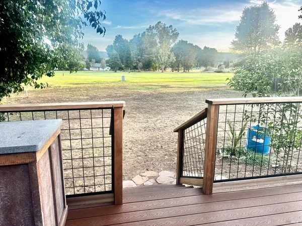 a view of swimming pool from a balcony