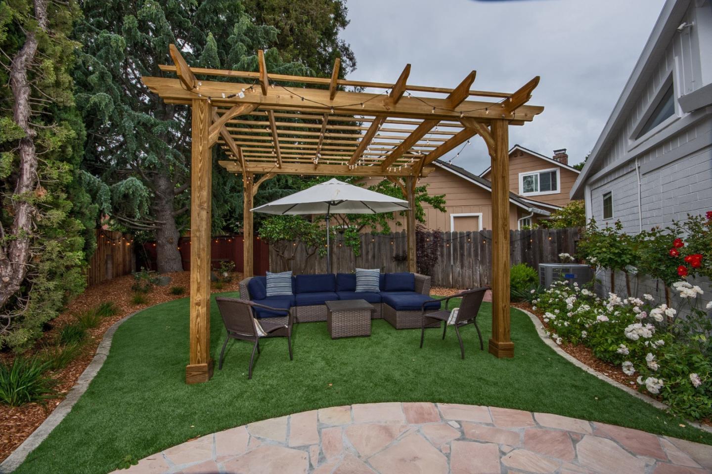 340 Jarvis Court Sunnyvale, CA 94086 - Photo 18 of 18 a patio with wooden table and chairs