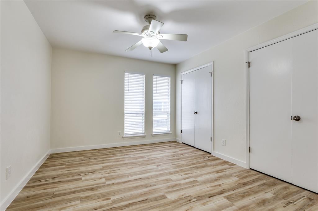 5844 Sandhurst Lane, Unit D Dallas, TX 75206 - Photo 24 of 31 a view of an empty room with a window