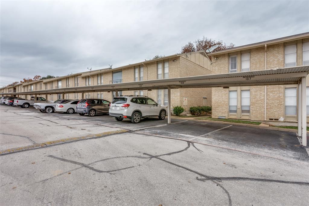 5844 Sandhurst Lane, Unit D Dallas, TX 75206 - Photo 30 of 31 a car parked in front of a building