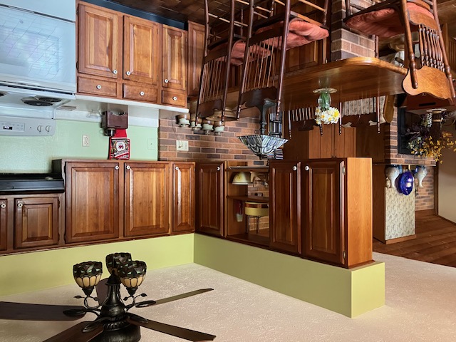 2066 Tolbert Road Hamilton, OH 45011 - Photo 19 of 63 This cozy kitchen features traditional wood cabinetry and functional appliances, ideal for everyday living.
