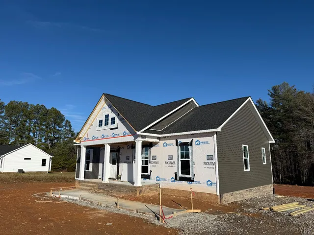 a front view of a house with a garage