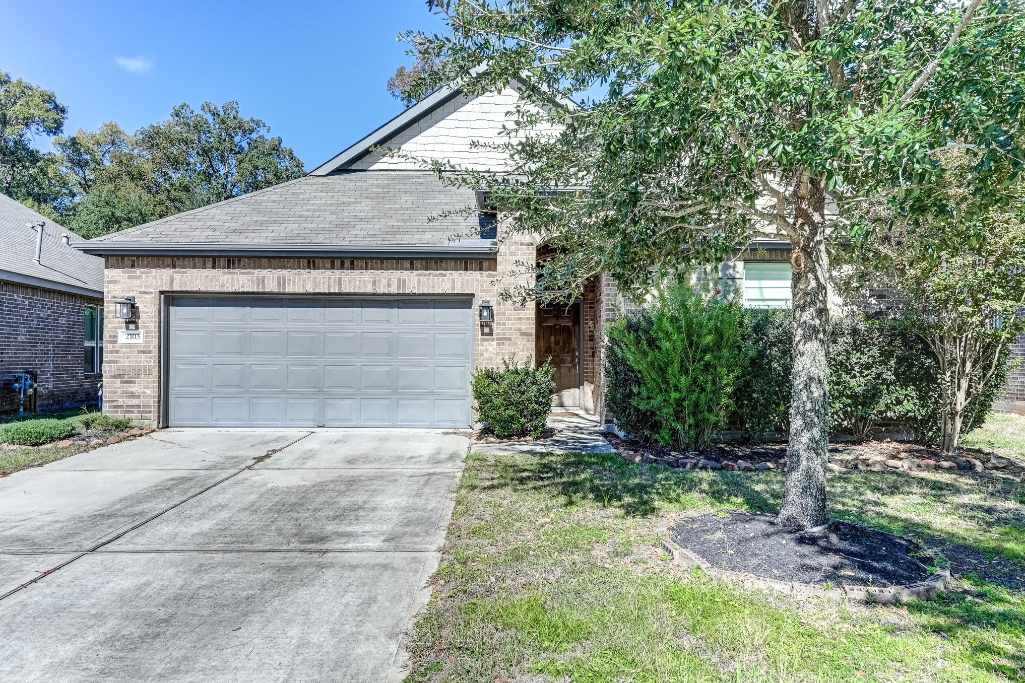 2103 Parnevik Place Conroe, TX 77304 - Photo 3 of 48