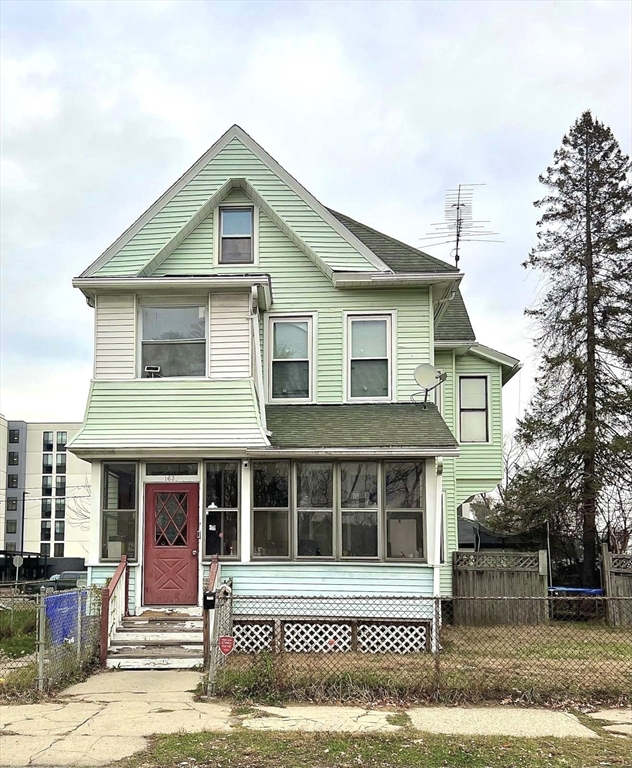 163 Marion Street Springfield, MA 01109 - Photo 2 of 3 a front view of a house with garden