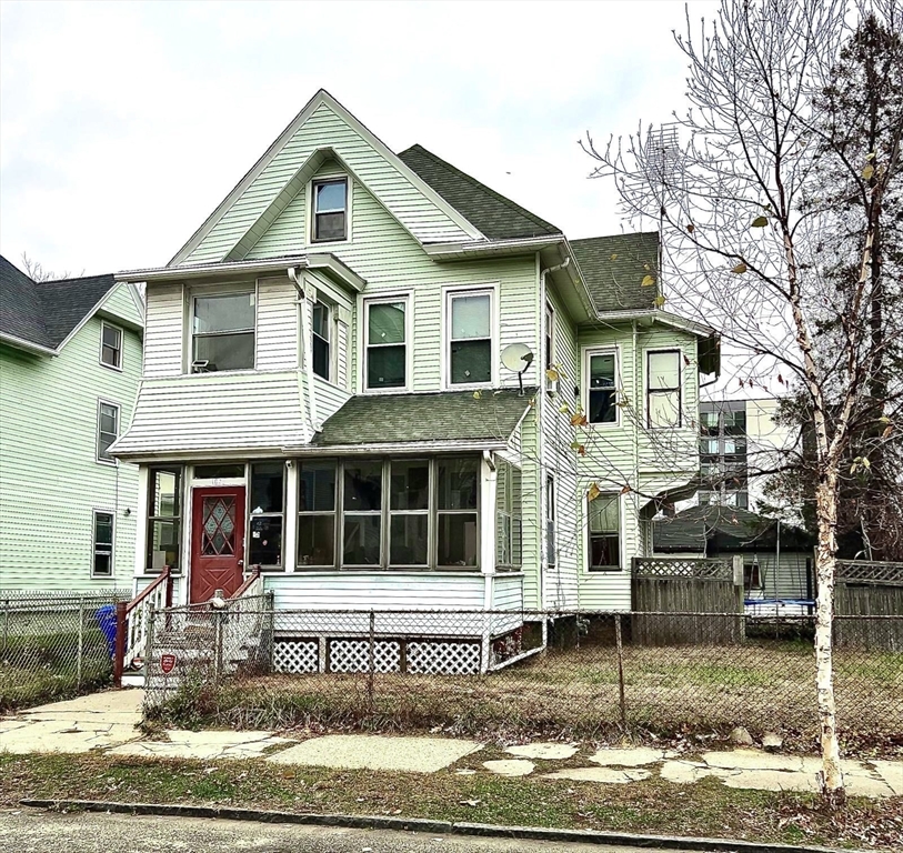 163 Marion Street Springfield, MA 01109 - Photo 3 of 3 a front view of a house with a yard