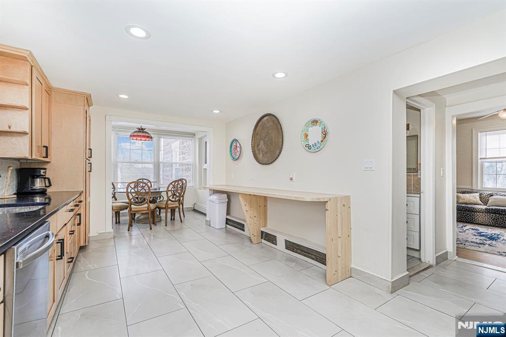 566 Teaneck Road Teaneck, NJ 07666 - Photo 12 of 35 a view of living room kitchen and entryway