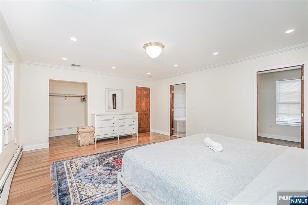 566 Teaneck Road Teaneck, NJ 07666 - Photo 29 of 35 a bedroom with furniture and a rug