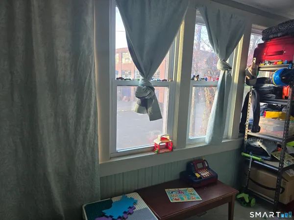a room with toys and a window