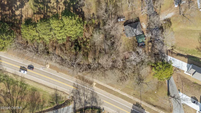 a view of road with yard