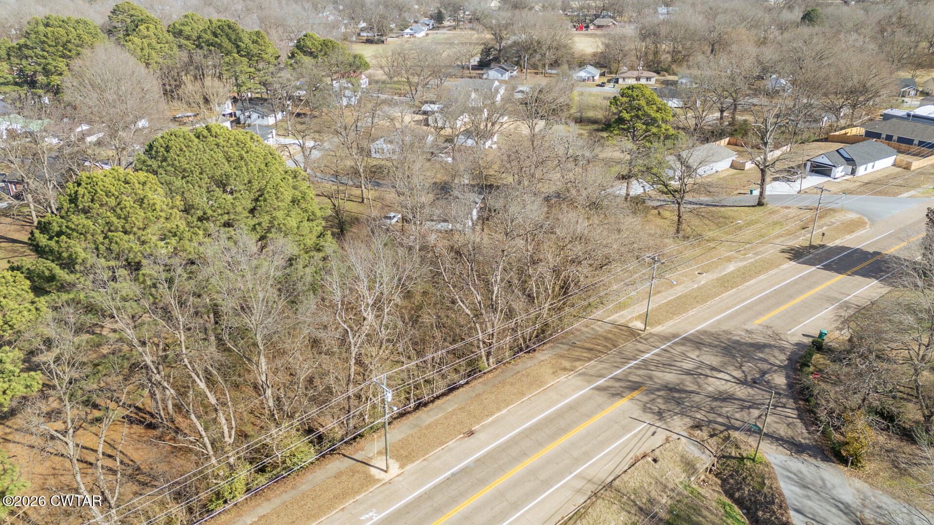 3036 North Main Street Milan, TN 38358 - Photo 10 of 10 a view of a yard with wooden fence