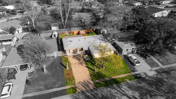 a view of a kitchen with refrigerator and stove