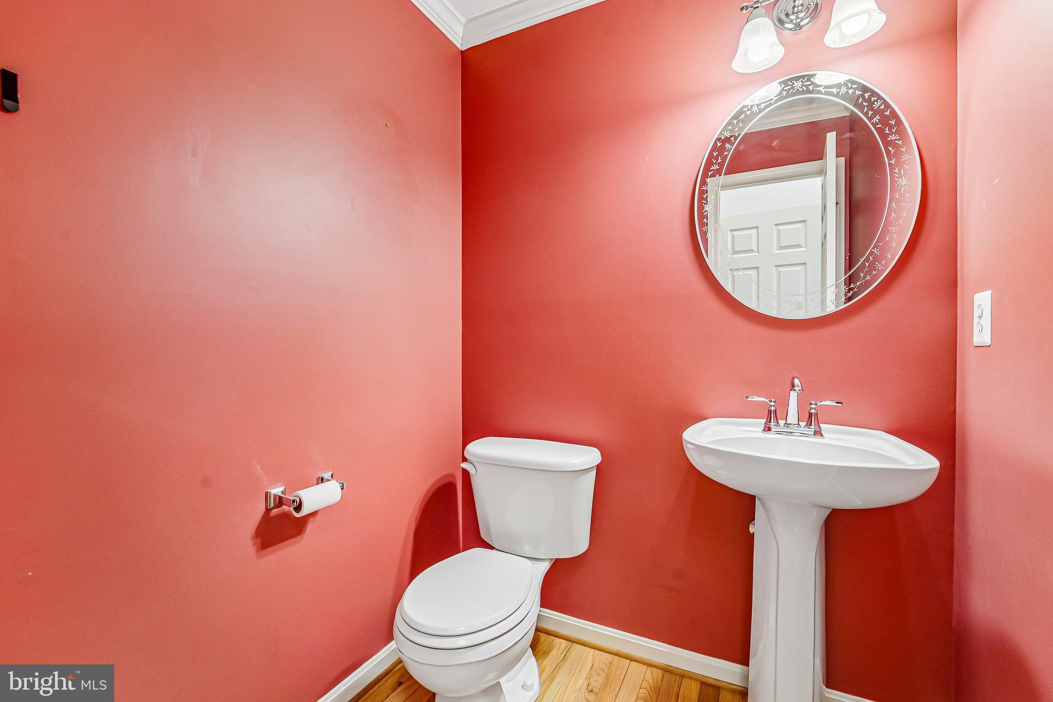 2422 Rippling Brook Road Frederick, MD 21701 - Photo 14 of 35 a bathroom with a sink mirror and toilet