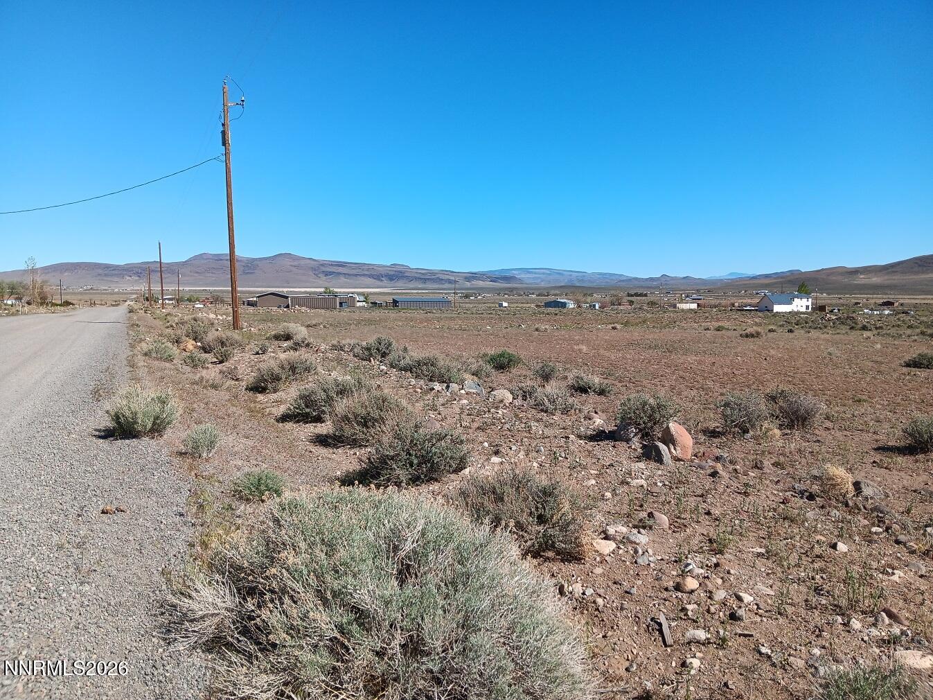 12405 Seneca Road Stagecoach, NV 89429 - Photo 1 of 6 a view of a road with a building in the background