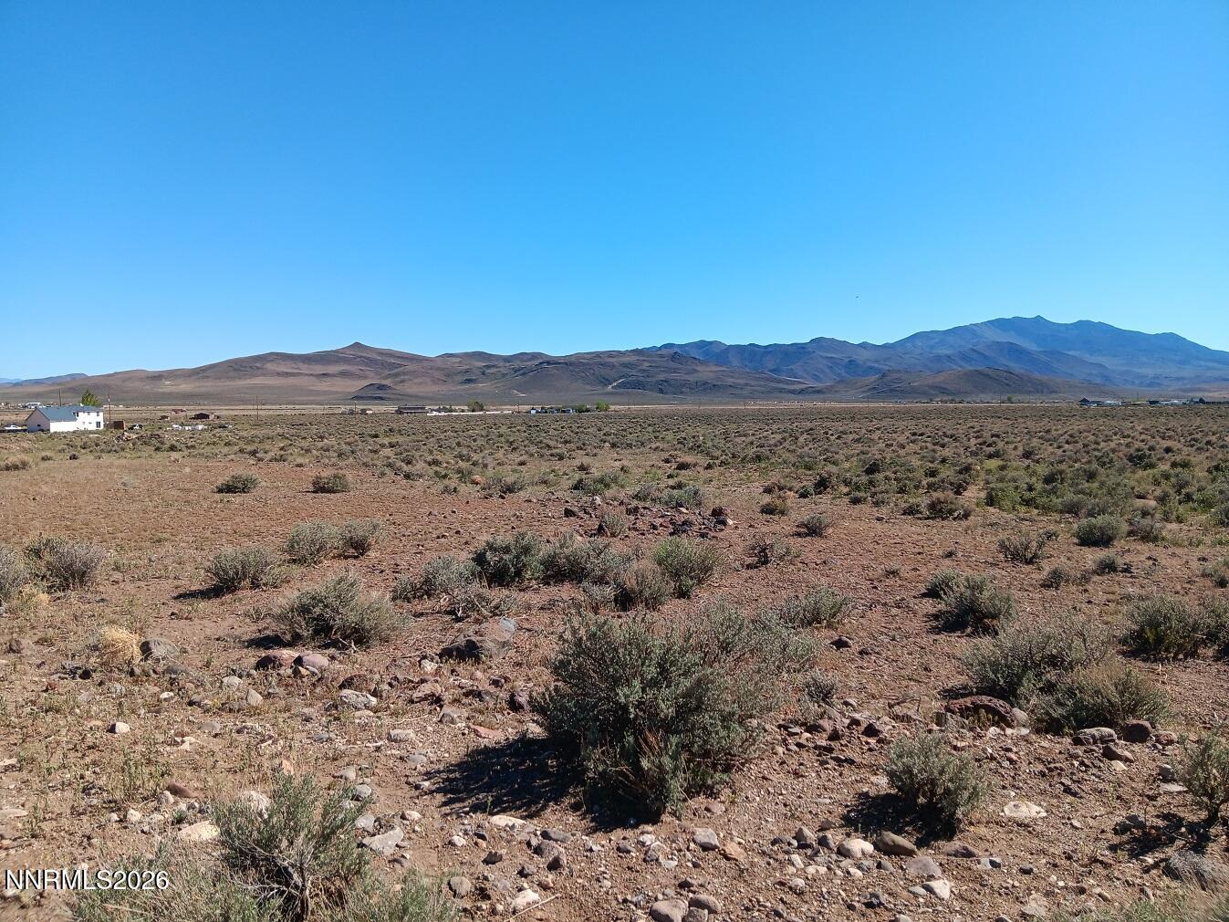 12405 Seneca Road Stagecoach, NV 89429 - Photo 3 of 6 a view of a mountain in the distance