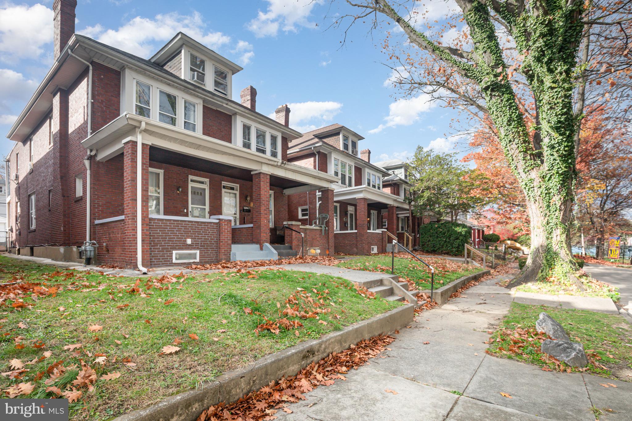 1204 North 16th Street Harrisburg, PA 17103 - Photo 2 of 30 a front view of a house with garden