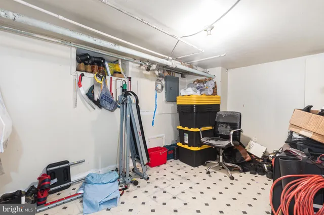 a room with furniture and gym equipment