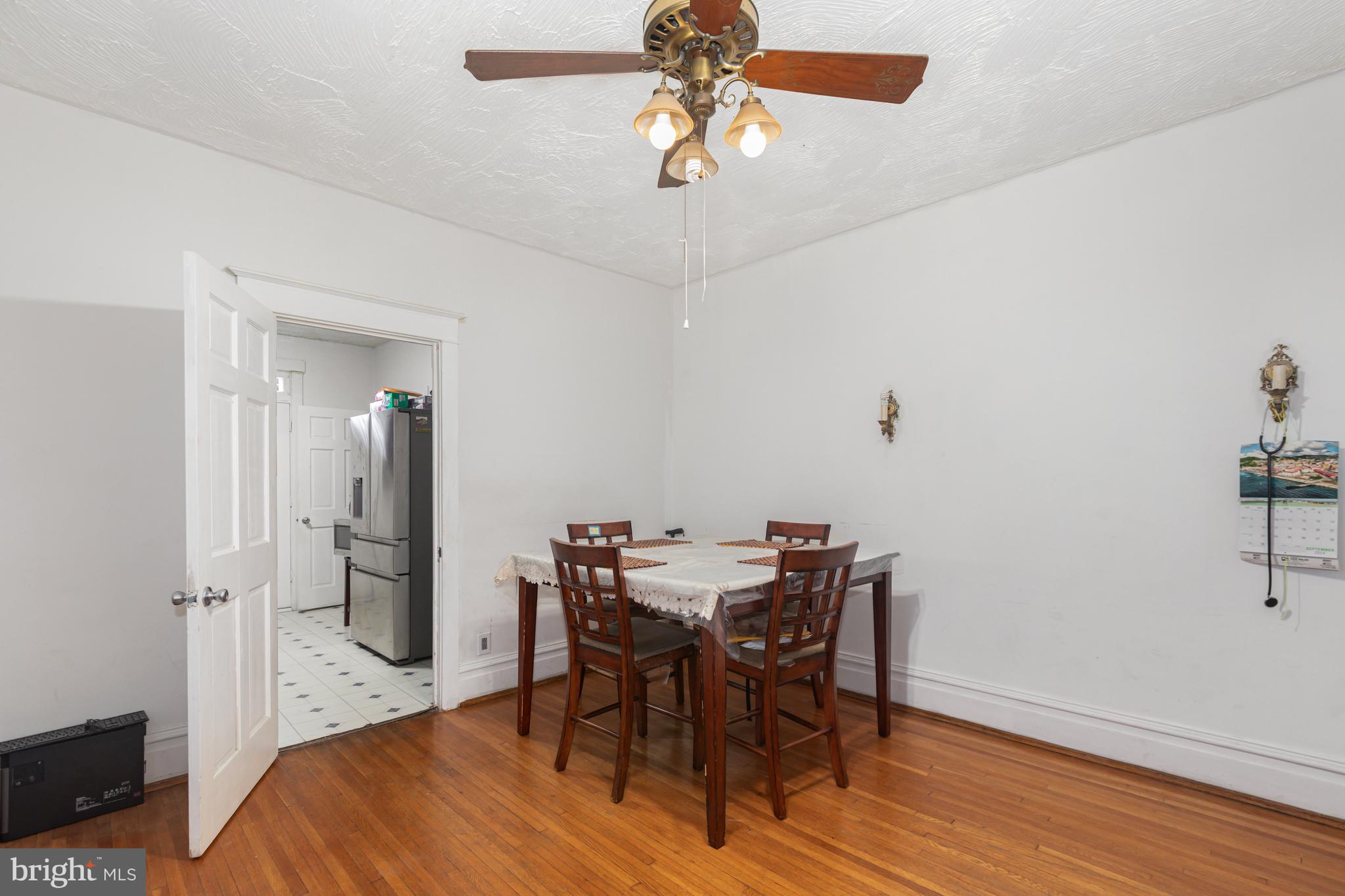 1204 North 16th Street Harrisburg, PA 17103 - Photo 9 of 30 a view of a dining room with furniture and wooden floor