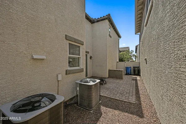 a front view of a house with a garage