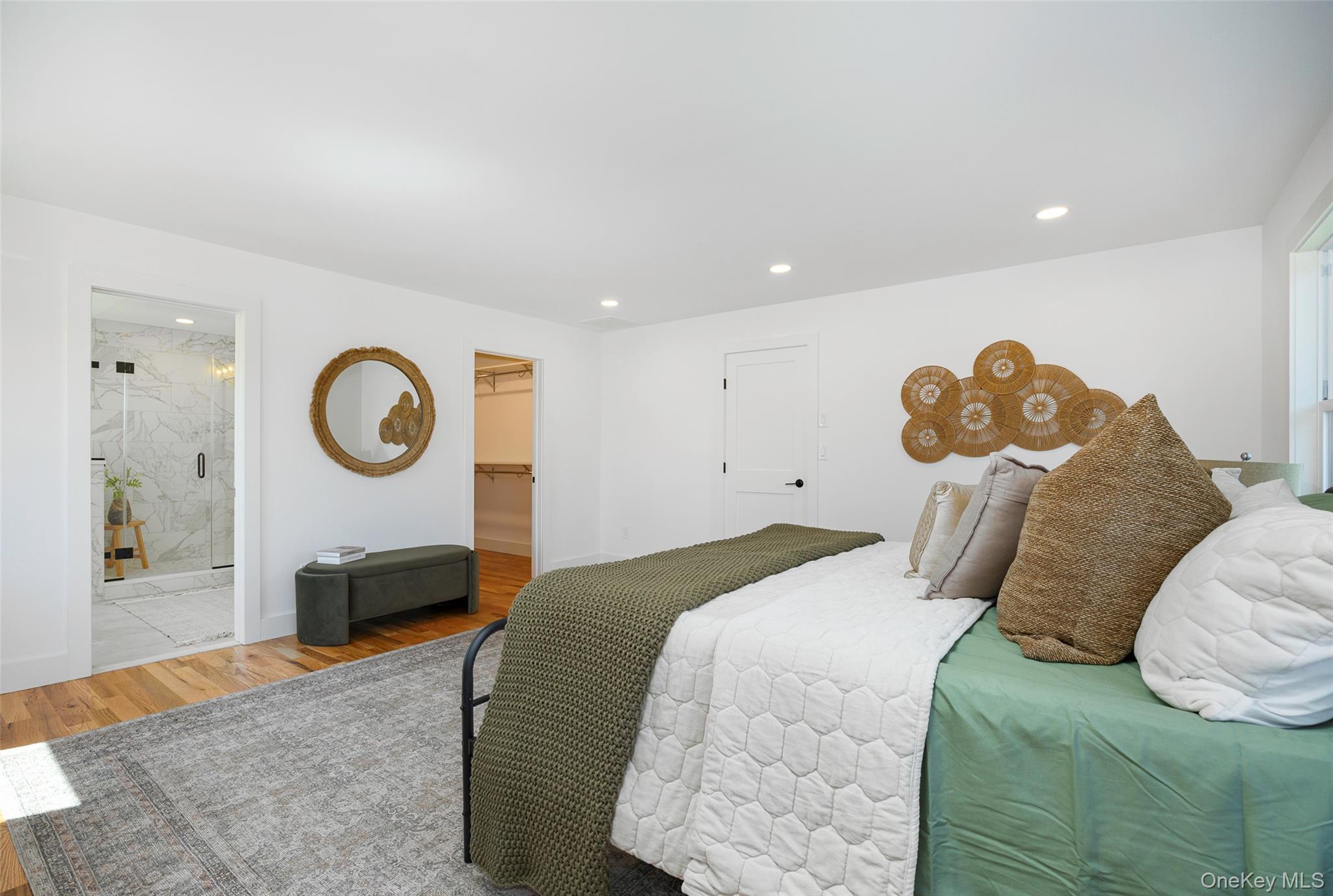 327 Hynes Road Poughquag, NY 12570 - Photo 23 of 39 Bedroom featuring a spacious closet, wood finished floors, recessed lighting, and ensuite bath