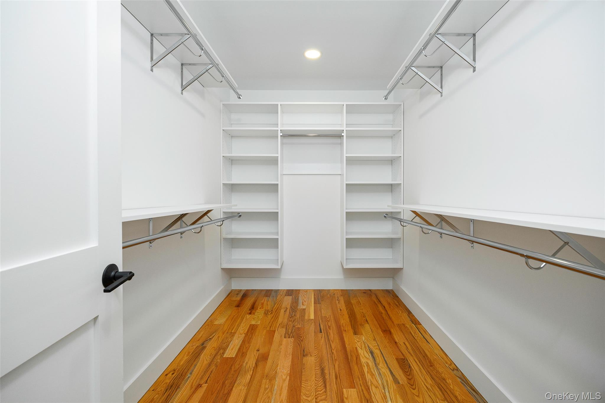 327 Hynes Road Poughquag, NY 12570 - Photo 27 of 39 Walk in closet with light wood finished floors
