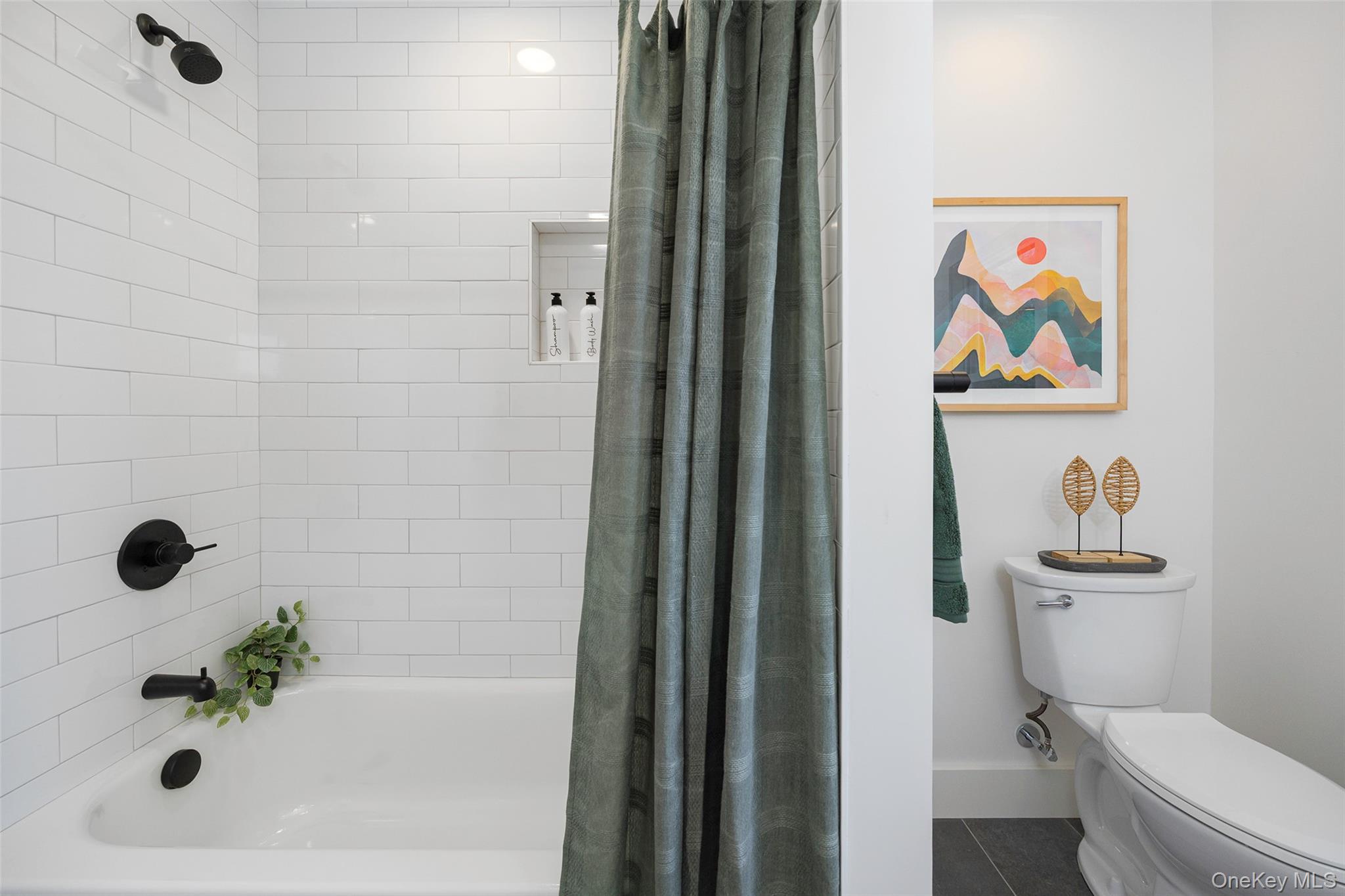 327 Hynes Road Poughquag, NY 12570 - Photo 30 of 39 Full bath with shower / bathtub combination with curtain and dark tile patterned flooring