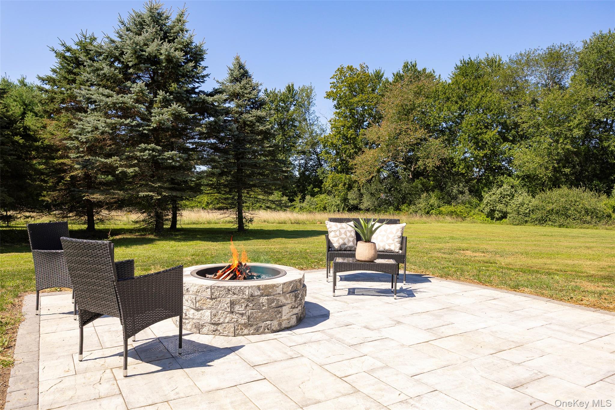 327 Hynes Road Poughquag, NY 12570 - Photo 35 of 39 View of patio / terrace featuring a fire pit and view of scattered trees