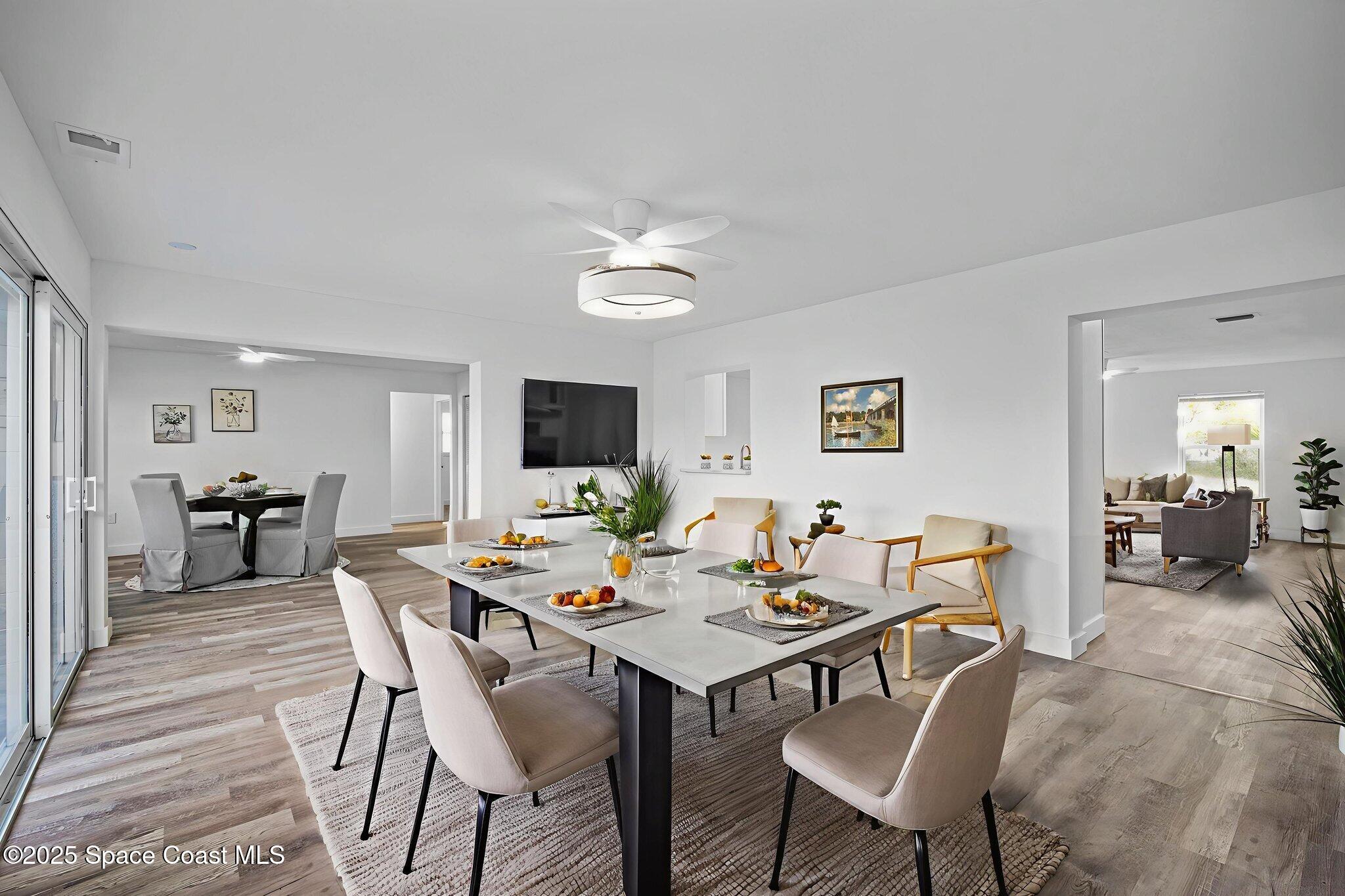 1390 Island Drive Merritt Island, FL 32952 - Photo 19 of 48 26-web-or-mls-Family Room virtually stag