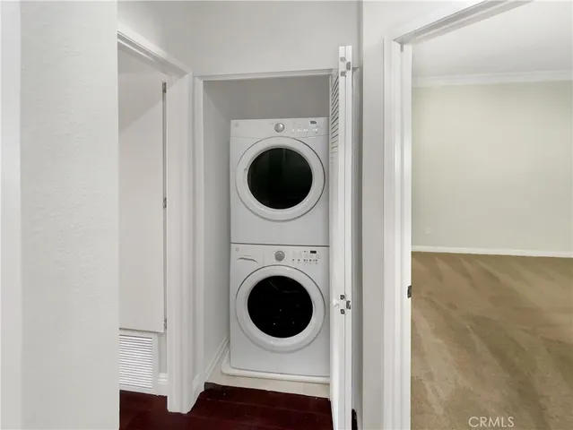 a spacious bathroom with a sink and a mirror
