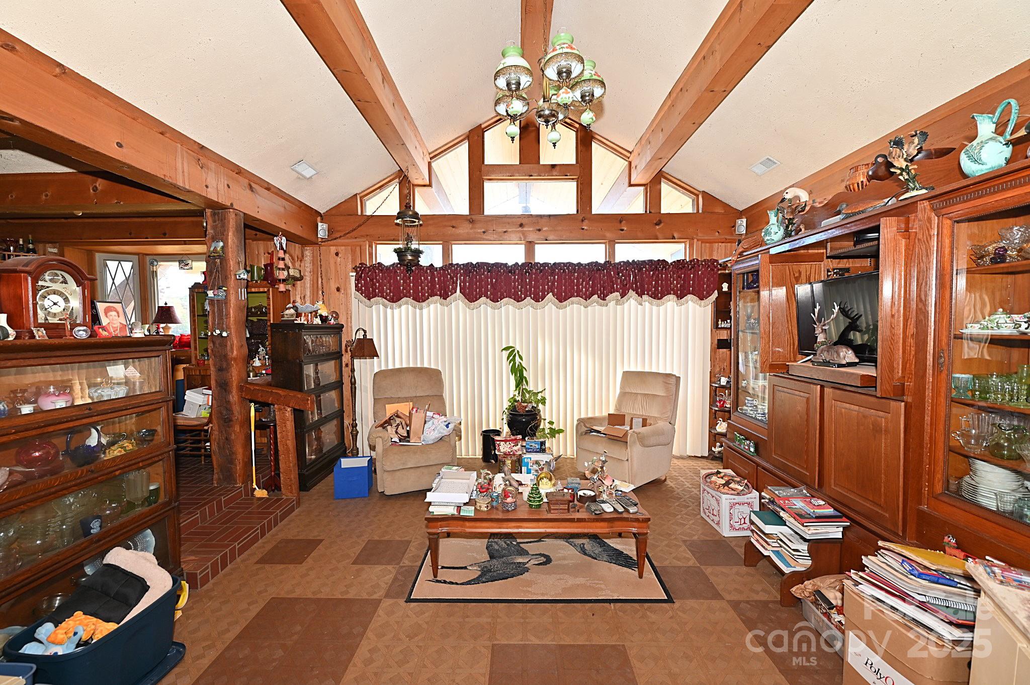 1859 Kale Road Catawba, NC 28609 - Photo 8 of 17 a living room with lots of furniture and a chandelier