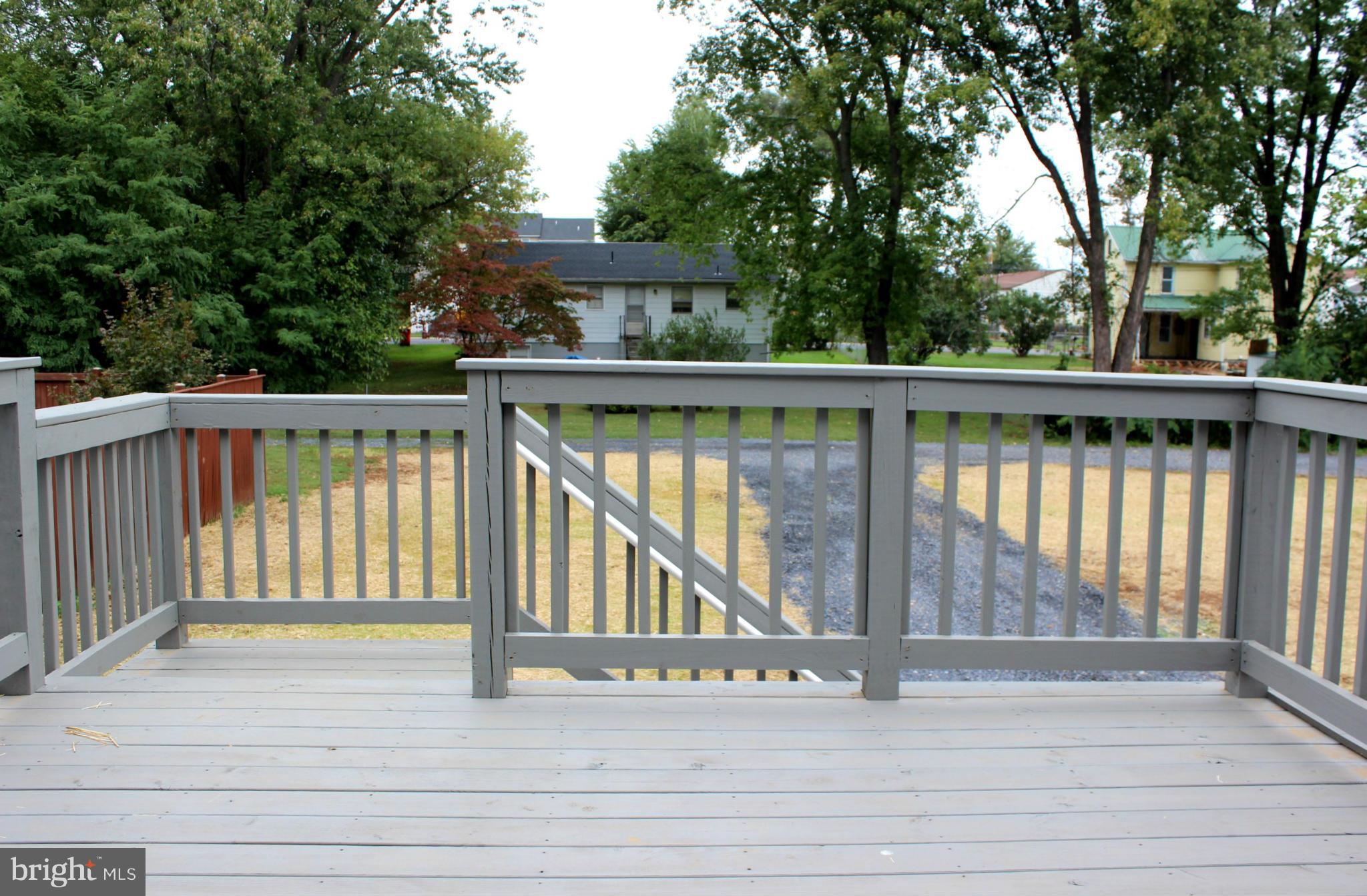 321 East 3rd Avenue Ranson, WV 25438 - Photo 14 of 15 a view of balcony with deck and trees