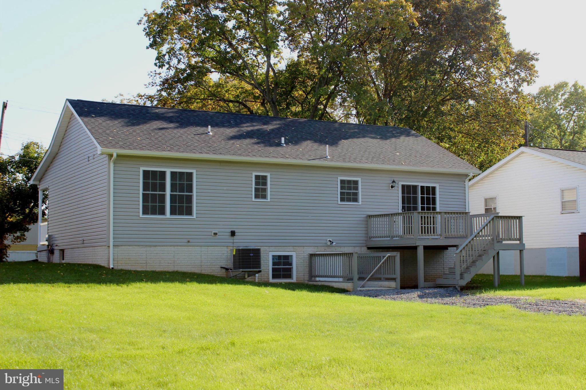 321 East 3rd Avenue Ranson, WV 25438 - Photo 15 of 15 a view of a house with pool and a yard