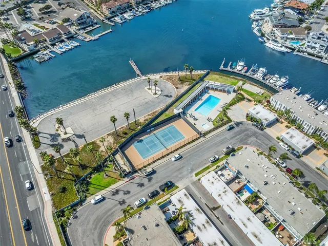 an aerial view of a swimming pool and outdoor space