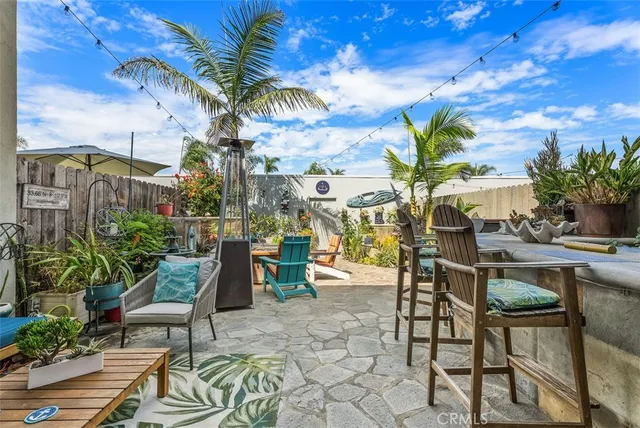 a view of a chairs and table in a patio